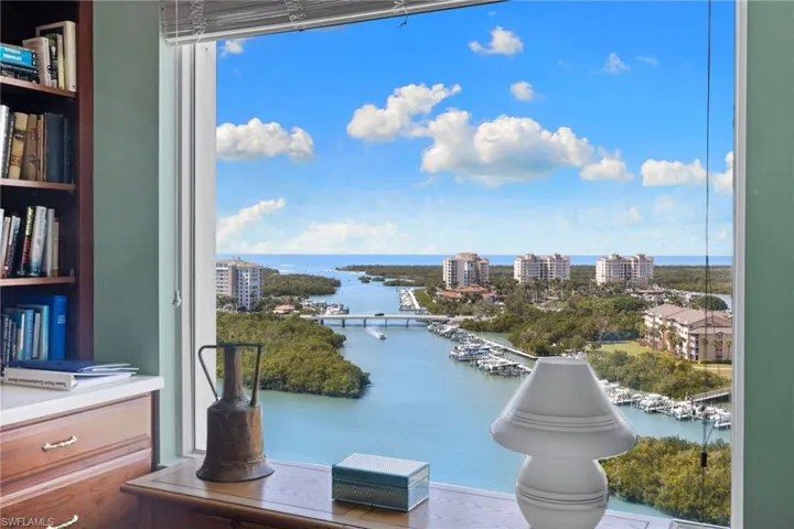 Water view featuring a marina and nearby urban area