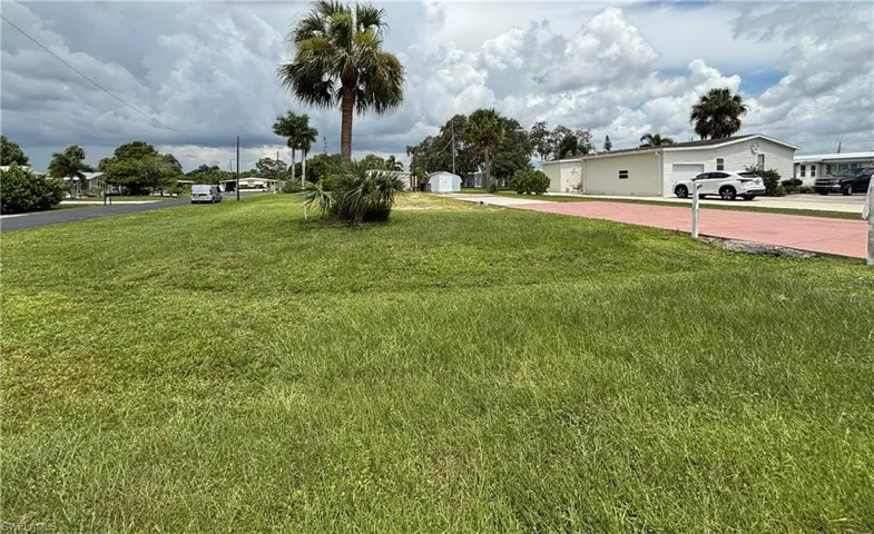 Yard is on North side of lot, front faces West, back East
