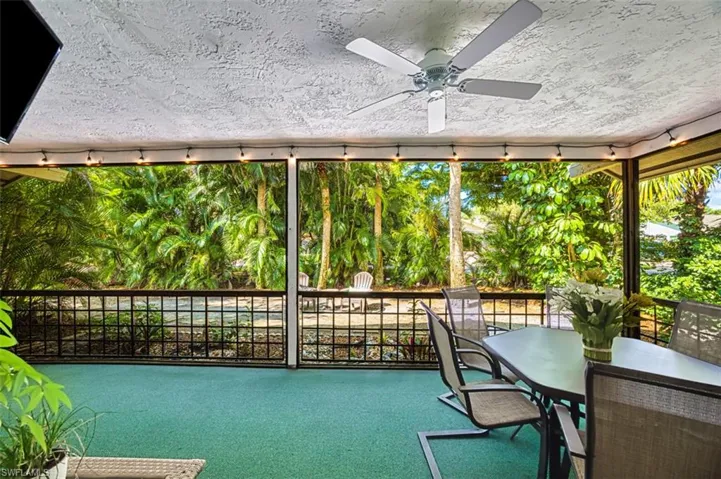 Sunroom featuring carpet