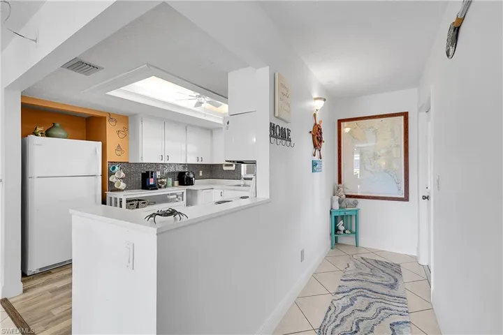 Kitchen is open to the foyer and makes bringing in groceries a breeze.