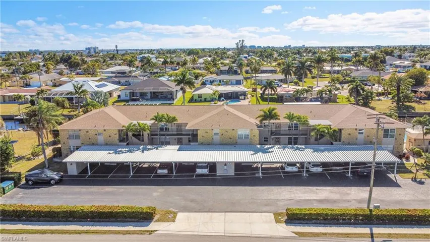 One of 2 buildings that make up Bella Vista. Each condo unit has an assigned covered parking spot and an exterior storage closet. Several guest parking spots are available.