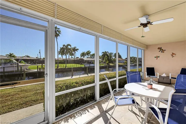 Large screened lanai stretches across almost the entire width of condo! Hurricane shutters protect furniture and sliders into unit.