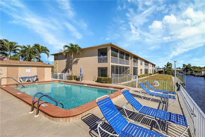 Heated pool with water view is located between the 2 buildings of Bella Vista. Only 20 units in this close knit community.