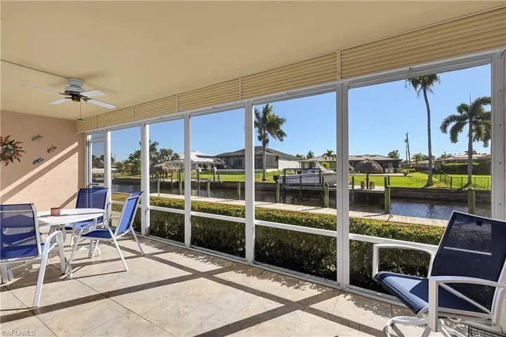 24'x8' lanai has wonderful canal view and hurricane shutters to protect the furniture and sliders.