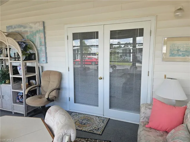Doorway with wood walls