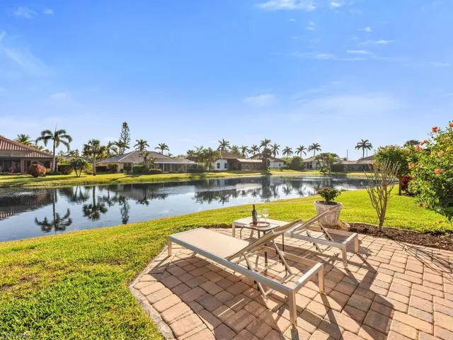 View of patio / terrace with a water view