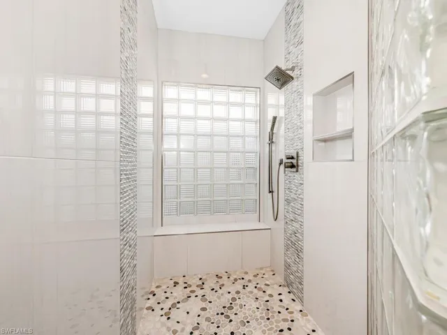 Bathroom with tiled shower