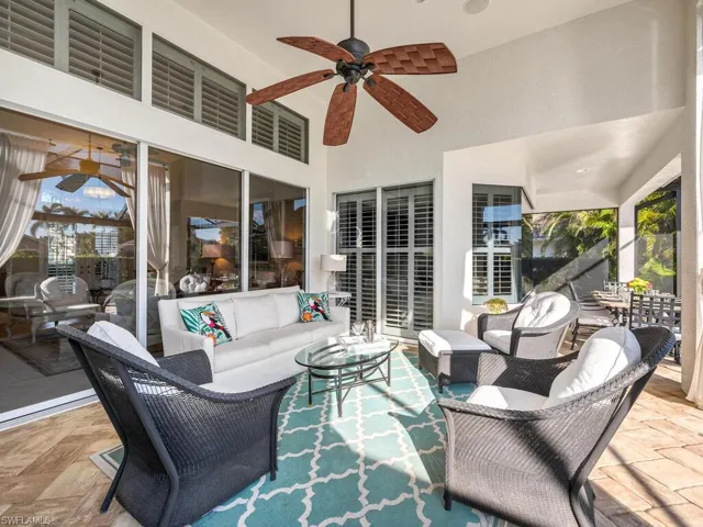 View of patio featuring outdoor lounge area and ceiling fan
