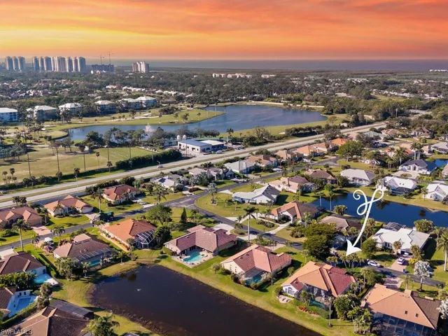 Aerial view at dusk with a water view