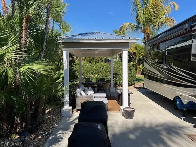 View of patio / terrace featuring a gazebo and an outdoor hangout area