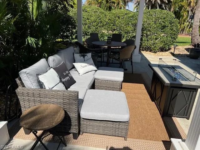 View of patio featuring an outdoor hangout area