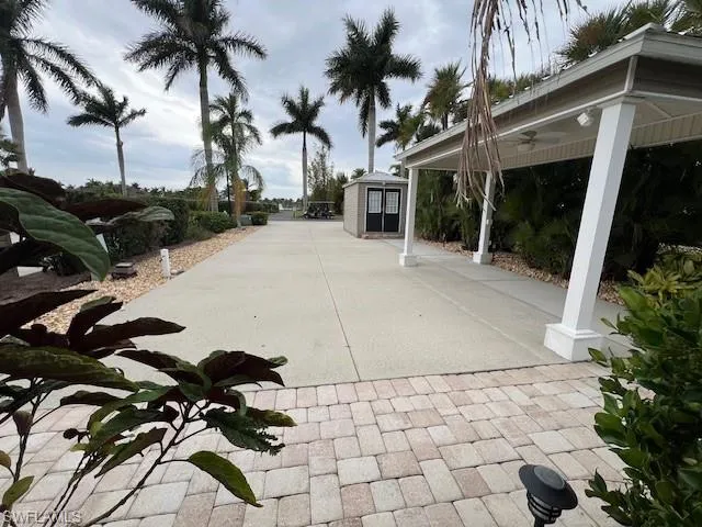 View of patio featuring ceiling fan