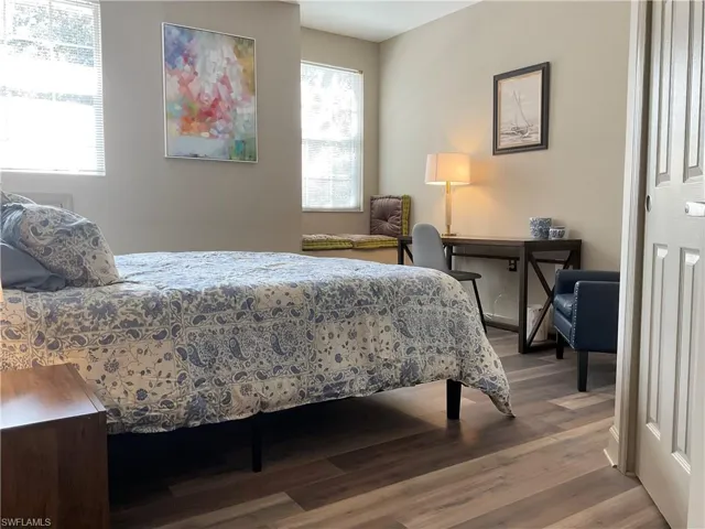 Guest Bedroom with king sized bed and window seat