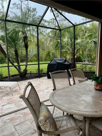 View of patio featuring a lanai and grilling area