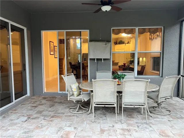 View of patio with ceiling fan