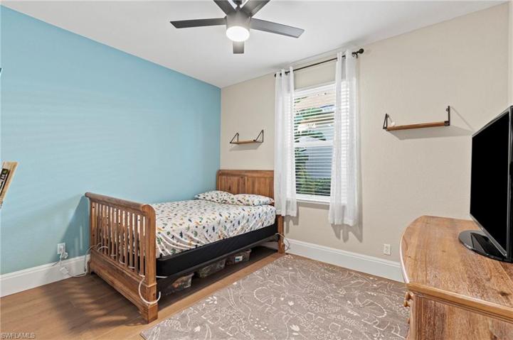 Guest Bedroom 1 w/ Pre Engineered Wood Floors
