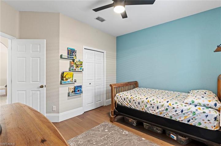 Guest Bedroom 1 w/ Pre Engineered Wood Floors