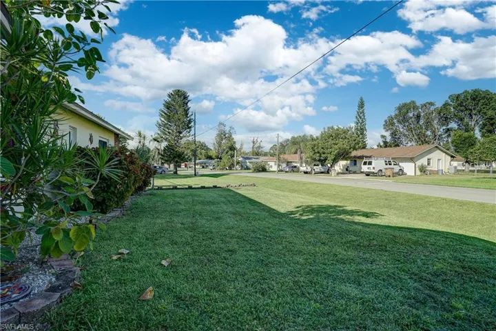 Lush green grass in the front yard also