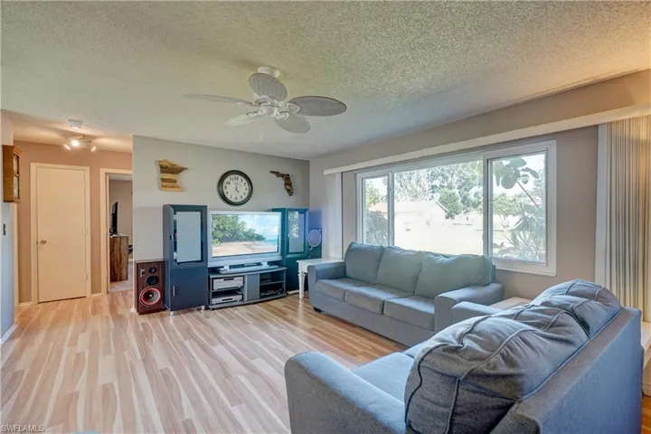 This living room is BIG at 20' x 14'