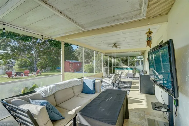 An expansive 43' x 12' screened lanai/porch