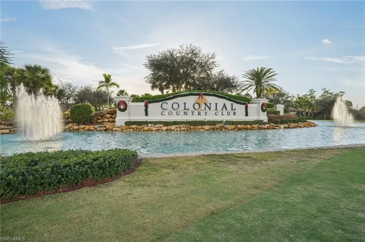Community sign featuring a lawn