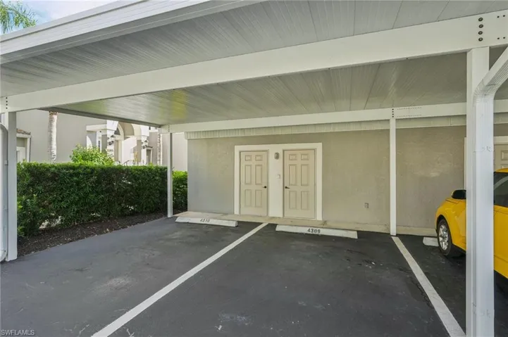 View of covered carport and Storge