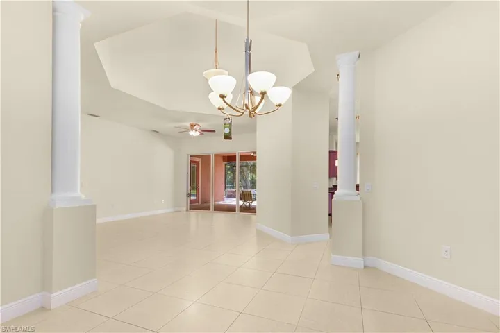 Elegant formal dining room highlighted by a soaring cupola that fills the space with natural light.