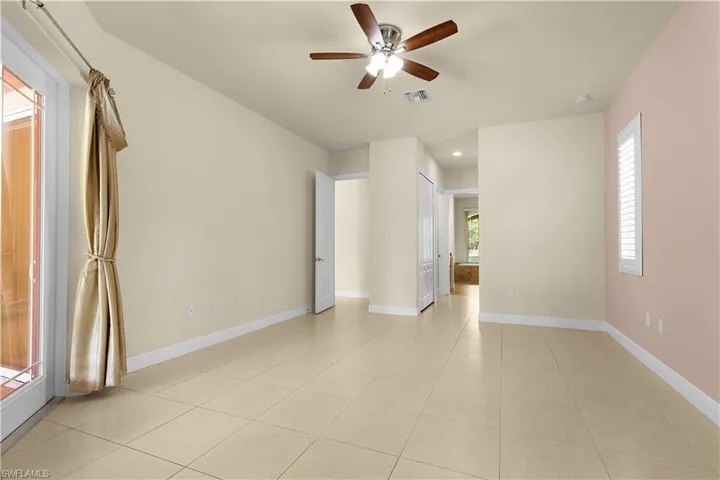 Laundry room with cabinets and a sink.