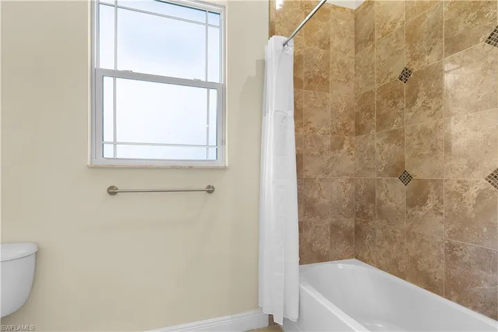 Jack and Jill bathroom between two guest bedrooms.