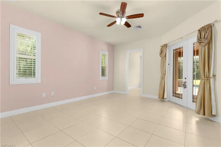 Flex room located off the primary suite with access to the pool and spa.