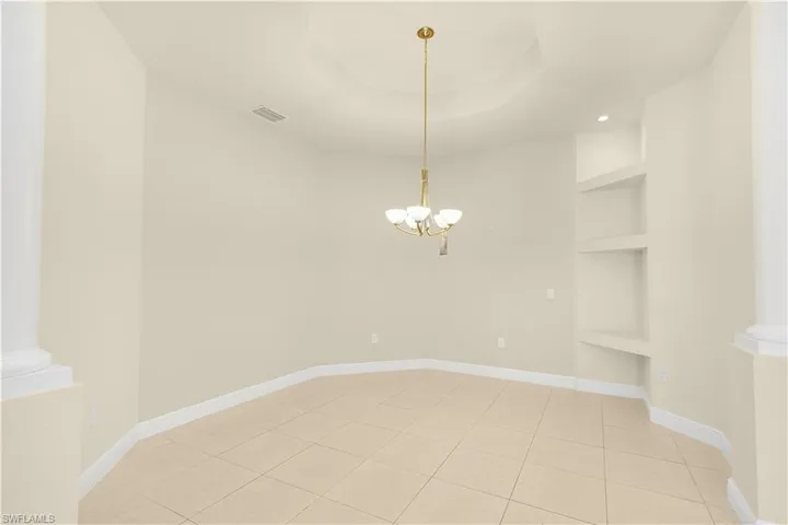 The home offers a split bedroom with the primary suite located to the left of the living room.