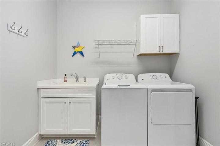 Laundry tub /gas dryer.