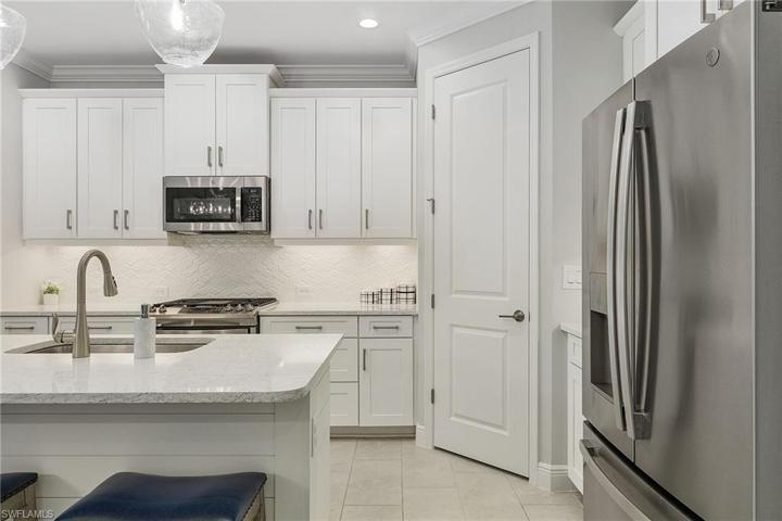 Natural Gas Stove and Walk-In Pantry.