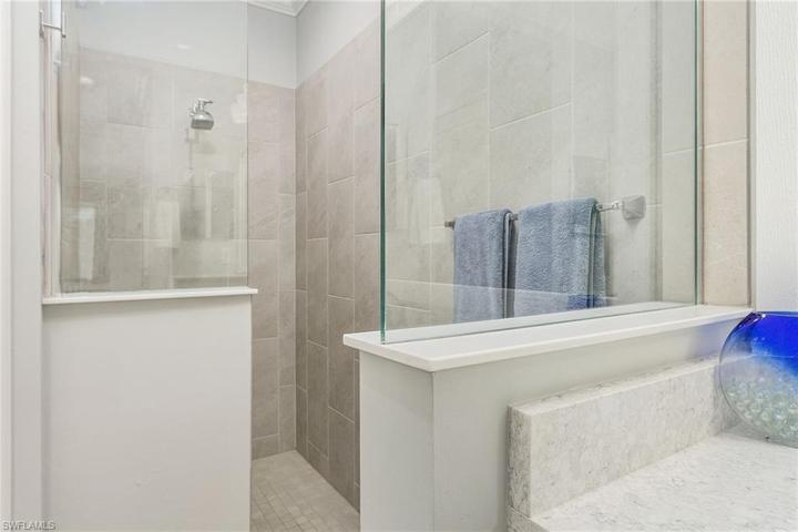 Walk In tiled shower.