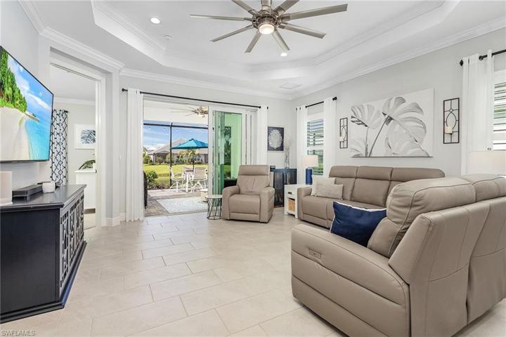 Great Room with volume tray ceiling.