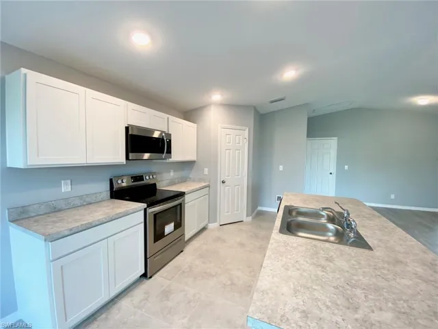 1427 NE 33rd  TER, Cape Coral, FL 33909