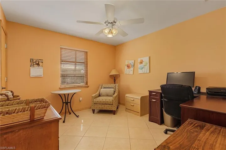 Guest bedroom #3 with a wali-in closet.  Currently being used as an office.