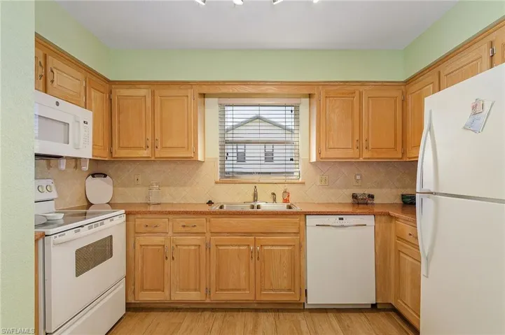 Good size kitchen with lots of cabinets.