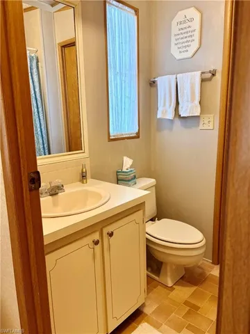 Bathroom with vanity and a shower with curtain