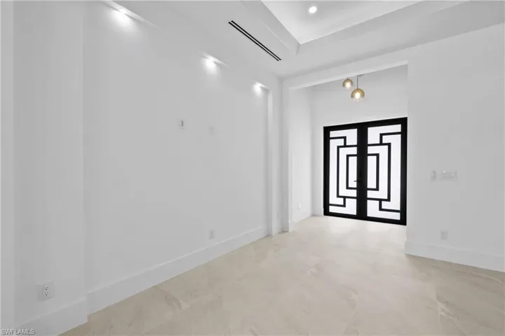 Empty room with baseboards