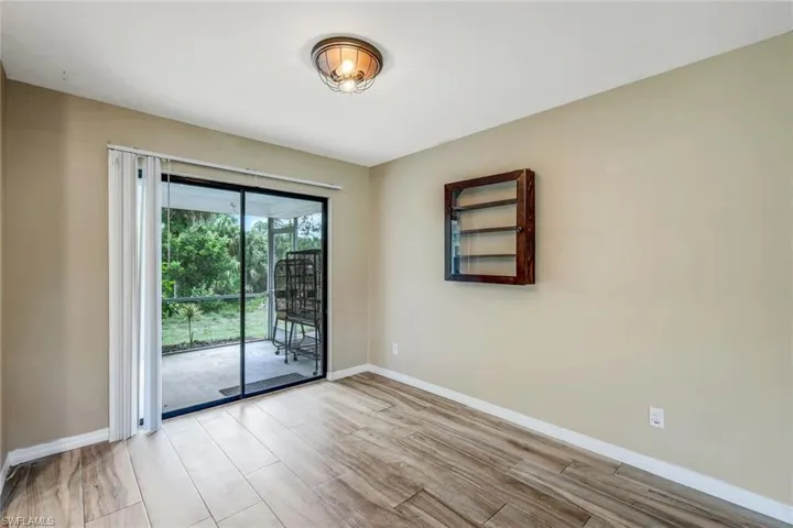 Spare room featuring light wood-type flooring