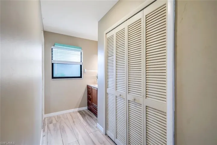 Hall with light wood-type flooring