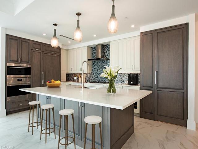 Wolf, Subzero, and Miele appliances featuring quartz countertops, under-counter wine cooler, beautiful wood cabinetry, walk-in pantry, and lots of storage. Slow close drawers and doors.