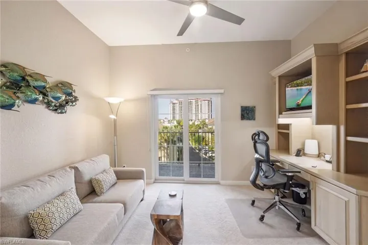 Bedroom #3, Home office with light carpet and balcony access