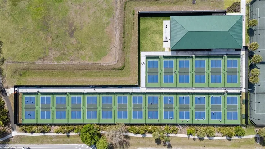 Drone / aerial view of Pickleball courts available for reservation via Pelican Bay Community Center