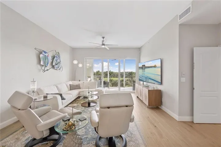 Living room with views of golf course