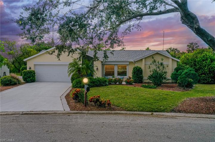 Beautiful shade tree frames this gorgeous home in Brookshire