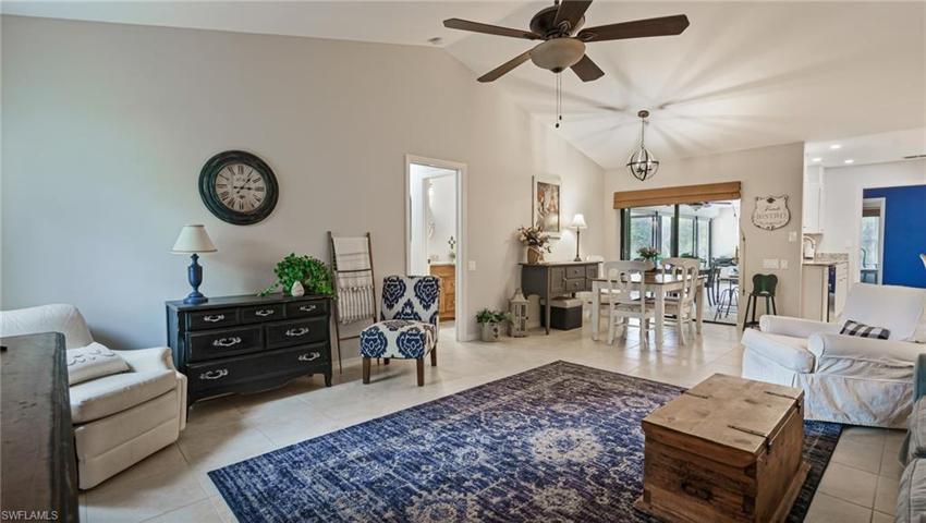 Vaulted ceilings are trending, and sliders to huge lanai