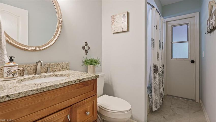 Guest bath with door to lanai