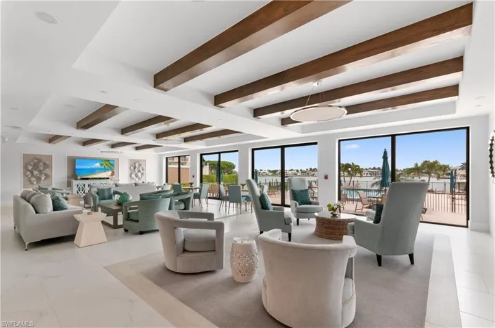 Social Room overlooking the pool deck and back bay.